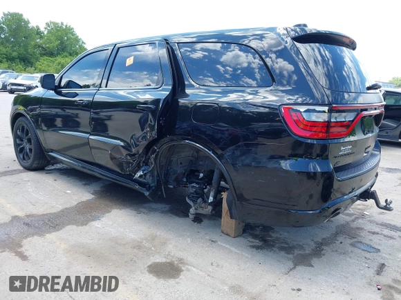 2019 Dodge Durango R/T with VIN 1C4SDJCT6KC692551, listed as a IAAI auction lot 42320969 with 87,502 mi miles and . Bid and sale history available at DreamBid. Image 3.