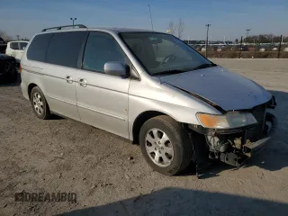 2004 Honda Odyssey EX-L with VIN 5FNRL18994B136383, listed as a Copart auction lot 48235275 with 188,030 mi miles and Salvage Title. Bid and sale history available at DreamBid. Image 4.