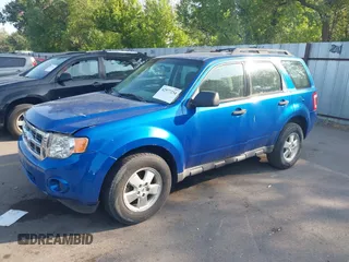 2011 Ford Escape XLS with VIN 1FMCU0C78BKC16059, listed as a IAAI auction lot 42577234 with 210,890 mi miles and . Bid and sale history available at DreamBid. Image 2.