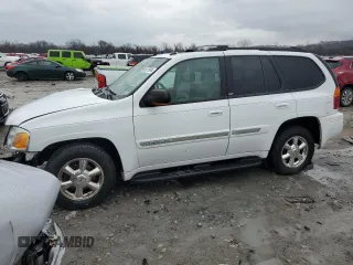 2004 GMC Envoy SLT with VIN 1GKDT13SX42404837, listed as a Copart auction lot 84515994 with 184,153 mi miles and Salvage Title. Bid and sale history available at carsss.com. Image 1.