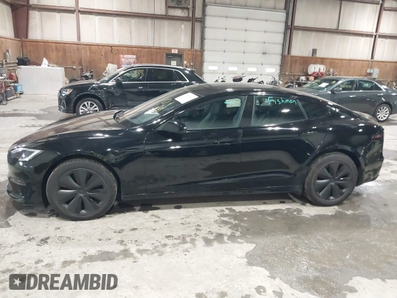 2022 Tesla Model S with VIN 5YJSA1E58NF478403, listed as a IAAI auction lot 41533099 with 42,779 mi miles and . Bid and sale history available at DreamBid. Image 14.