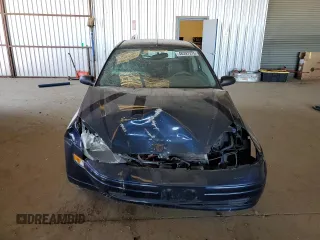 2004 Ford Focus ZX3 with VIN 3FAFP31Z44R127138, listed as a Copart auction lot 48397275 with 129,873 mi miles and Salvage title. Bid and sale history available at DreamBid. Image 5.