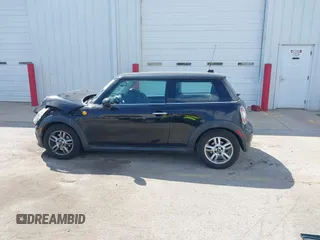2011 MINI Hardtop with VIN WMWSU3C50BT098967, listed as a IAAI auction lot 42021501 with 120,216 mi miles and . Bid and sale history available at DreamBid. Image 15.