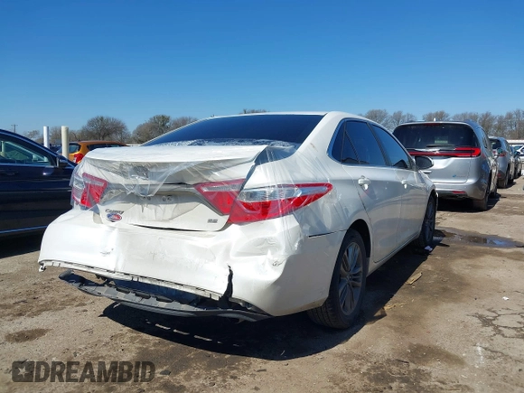 2015 Toyota Camry XLE with VIN 4T1BF1FK5FU114661, listed as a IAAI auction lot 41633878 with 124,013 mi miles and . Bid and sale history available at DreamBid. Image 4.