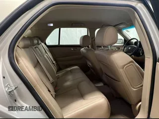 2007 Cadillac DTS V8 z VIN 1G6KD57Y27U198589, wystawiony jako Copart lot #59233755 z przebiegiem 171 023 mil mil oraz Tytuł czysty. Historia ofert i sprzedaży dostępna na DreamBid. Obrazek 6.