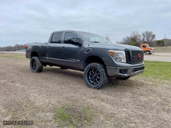 2016 Nissan Titan XD S with VIN 1N6BA1F31GN517461, listed as a Copart auction lot 48740415 with NaN miles and Clean Title. Bid and sale history available at carsss.com. Image 1.
