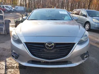 2014 Mazda 3 S Grand Touring with VIN JM1BM1W38E1184450, listed as a IAAI auction lot 40954511 with 157,036 mi miles and . Bid and sale history available at DreamBid. Image 11.