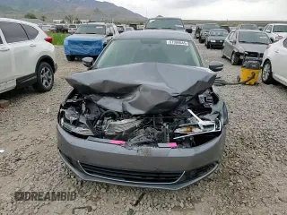 2014 Volkswagen Jetta SE z VIN 3VWD07AJ4EM239120, wystawiony jako Copart lot #57304045 z przebiegiem 183 748 mil mil oraz Szkoda całkowita • Salvage title. Historia ofert i sprzedaży dostępna na DreamBid. Obrazek 13.