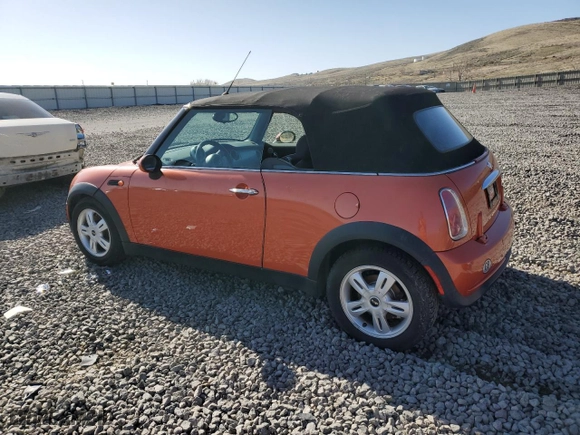 2005 MINI Cooper Convertible with VIN WMWRF33485TG10403, listed as a Copart auction lot 52459735 with 118,445 mi miles and Clean Title. Bid and sale history available at carsss.com. Image 2.