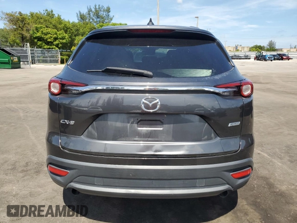 2016 Mazda CX-9 Touring with VIN JM3TCACY3G0115334, listed as a Copart auction lot 64129265 with 156,674 mi miles and Clean title. Bid and sale history available at DreamBid. Image 6.