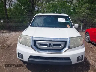2011 Honda Pilot EX-L with VIN 5FNYF4H58BB085635, listed as a IAAI auction lot 42114205 with 218,399 mi miles. Bid and sale history available at carsss.com. Image 12.