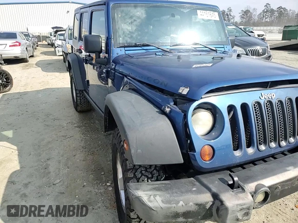 2009 Jeep Wrangler Unlimited Rubicon z VIN 1J4GA69179L763259, wystawiony jako Copart lot #44161645 z przebiegiem 153 146 mil mil oraz Szkoda całkowita • Salvage title. Historia ofert i sprzedaży dostępna na DreamBid. Obrazek 11.