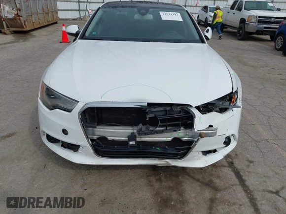 2013 Audi A6 Premium Plus z VIN WAUGGAFC3DN081065, wystawiony jako IAAI lot #41931342 z przebiegiem 136 570 mil mil oraz . Historia ofert i sprzedaży dostępna na DreamBid. Obrazek 12.