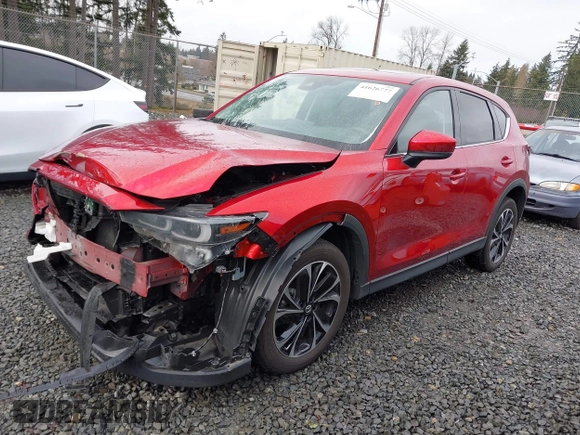 2023 Mazda CX-5 2.5 S Premium Package with VIN JM3KFBDM1P0161605, listed as a IAAI auction lot 41626777 with 26,581 mi miles. Bid and sale history available at carsss.com. Image 15.