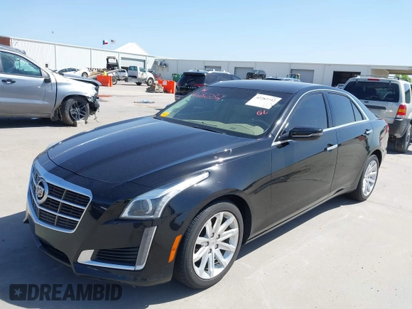2014 Cadillac CTS Luxury RWD z VIN 1G6AR5SX3E0196348, wystawiony jako IAAI lot #42282732 z przebiegiem 130 956 mil mil oraz . Historia ofert i sprzedaży dostępna na DreamBid. Obrazek 2.