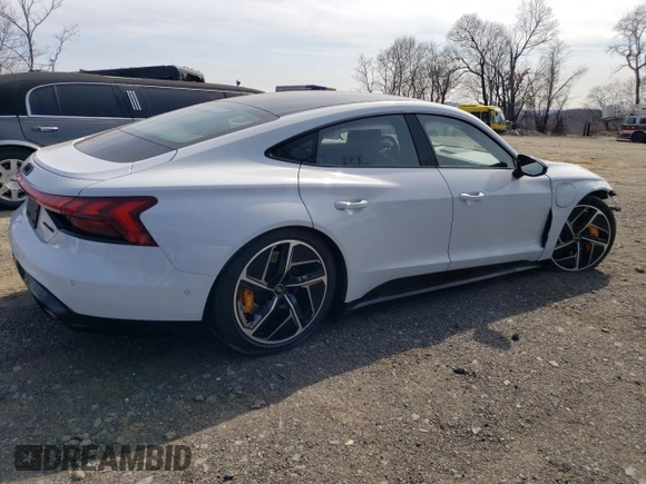 2024 Audi RS e-tron GT z VIN WAUBHBFW7R7901666, wystawiony jako Copart lot #49103775 z przebiegiem 7651 mil mil oraz Szkody całkowita. Historia ofert i sprzedaży dostępna na DreamBid. Obrazek 3.