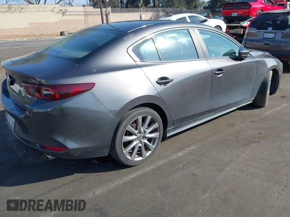 2019 Mazda 3 w/Select with VIN 3MZBPAAL1KM105498, listed as a IAAI auction lot 41601386 with 113,203 mi miles. Bid and sale history available at carsss.com. Image 4.