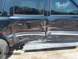 2005 Chevrolet Suburban LT z VIN 3GNEC16Z15G244050, wystawiony jako IAAI lot #42218360 z przebiegiem 124 837 mil mil oraz . Historia ofert i sprzedaży dostępna na DreamBid. Obrazek 6.