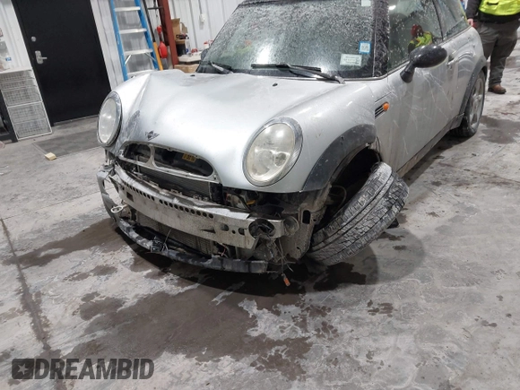 2002 MINI Hardtop with VIN WMWRC33422TC37296, listed as a IAAI auction lot 41385046 with 107,663 mi miles and . Bid and sale history available at DreamBid. Image 6.