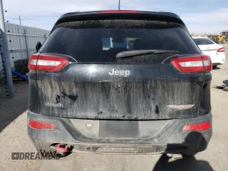 2016 Jeep Cherokee Trailhawk with VIN 1C4PJMBSXGW131199, listed as a Copart auction lot 49292505 with 97,359 mi miles and Salvage Title. Bid and sale history available at DreamBid. Image 6.