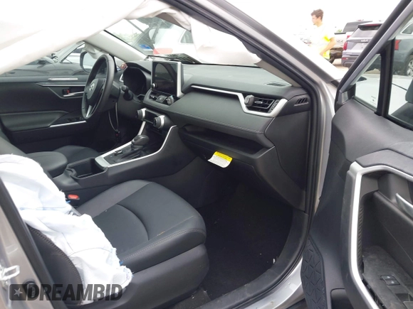 2023 Toyota RAV4 Hybrid XLE Premium z VIN 4T3B6RFV2PU138031, wystawiony jako IAAI lot #42127990 z przebiegiem 14 191 mil mil oraz . Historia ofert i sprzedaży dostępna na DreamBid. Obrazek 5.