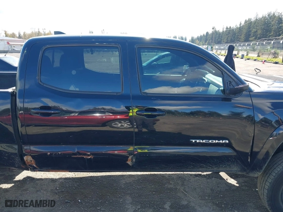 2016 Toyota Tacoma SR5 with VIN 5TFDZ5BN7GX001869, listed as a IAAI auction lot 40610002 with 184,380 mi miles. Bid and sale history available at carsss.com. Image 13.