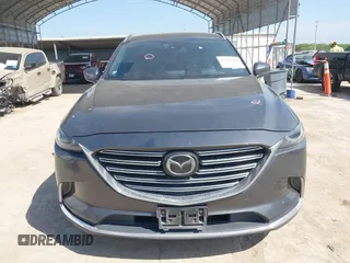 2016 Mazda CX-9 Grand Touring with VIN JM3TCADY5G0120033, listed as a IAAI auction lot 42248488 with 150,044 mi miles and . Bid and sale history available at DreamBid. Image 13.