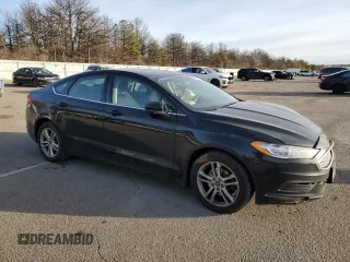 2018 Ford Fusion SE with VIN 3FA6P0HD0JR210070, listed as a Copart auction lot 43629525 with 161,373 mi miles and Salvage Title. Bid and sale history available at DreamBid. Image 4.