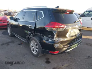 2017 Nissan Rogue S with VIN KNMAT2MT1HP588697, listed as a IAAI auction lot 41146939 with 88,704 mi miles and . Bid and sale history available at DreamBid. Image 3.