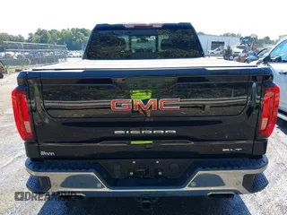 2021 GMC Sierra 1500 SLT z VIN 1GTU9DED7MZ174191, wystawiony jako IAAI lot #40378166 z przebiegiem 94 834 mil mil oraz . Historia ofert i sprzedaży dostępna na DreamBid. Obrazek 16.