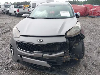 2018 Kia Sportage EX with VIN KNDPN3AC0J7310720, listed as a IAAI auction lot 42400165 with 118,929 mi miles and . Bid and sale history available at DreamBid. Image 6.