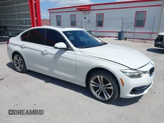 2018 BMW 3 Series 330i with VIN WBA8B9G52JNU57283, listed as a IAAI auction lot 42042507 with 51,740 mi miles and . Bid and sale history available at DreamBid. Image 1.