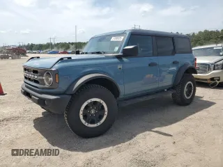 2023 Ford Bronco z VIN 1FMDE5DH8PLB73544, wystawiony jako Copart lot #57086695 z przebiegiem 12 412 mil mil oraz Szkoda całkowita • Salvage title. Historia ofert i sprzedaży dostępna na DreamBid. Obrazek 1.