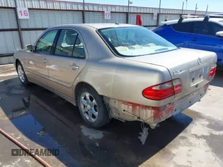 2002 Mercedes-Benz E-Class with VIN WDBJF65J42B394017, listed as a IAAI auction lot 41706917 with 188,883 mi miles. Bid and sale history available at carsss.com. Image 3.