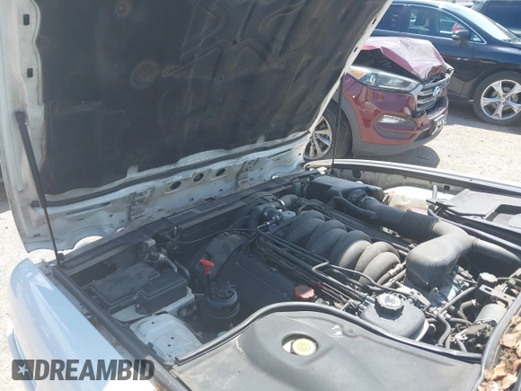 2003 Jaguar XJ 8 with VIN SAJDA14C03LF52338, listed as a IAAI auction lot 42684038 with 142,107 mi miles and . Bid and sale history available at DreamBid. Image 10.