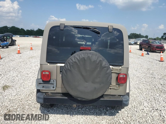 2003 Jeep Wrangler Sahara with VIN 1J4FA59S53P369077, listed as a Copart auction lot 61445025 with 147,904 mi miles and Clean title. Bid and sale history available at DreamBid. Image 6.