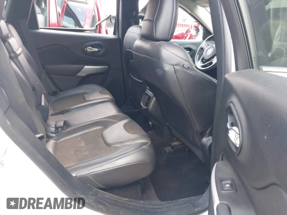 2018 Jeep Cherokee Latitude Plus with VIN 1C4PJLLBXJD590695, listed as a IAAI auction lot 39653845 with 76,667 mi miles and . Bid and sale history available at DreamBid. Image 8.