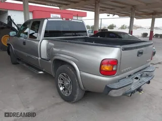 2003 GMC Sierra 1500 SLT with VIN 1GTEC19TX3Z212534, listed as a IAAI auction lot 41591390 with 158,457 mi miles. Bid and sale history available at carsss.com. Image 3.