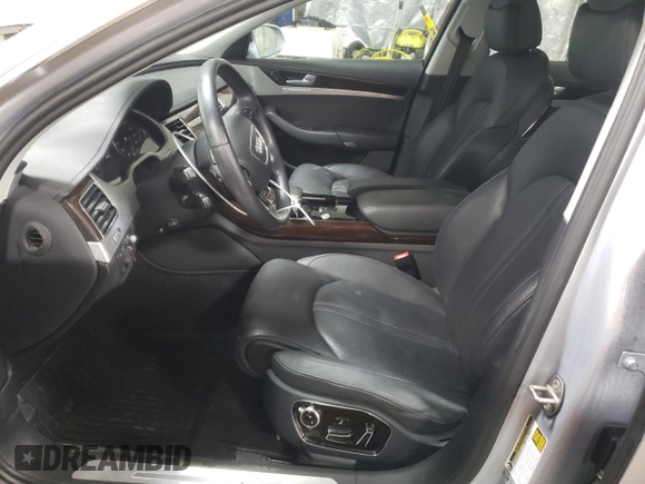 2015 Audi A8 with VIN WAUJGAFD1FN011100, listed as a Copart auction lot 49166055 with 38,575 mi miles and Salvage title. Bid and sale history available at DreamBid. Image 7.
