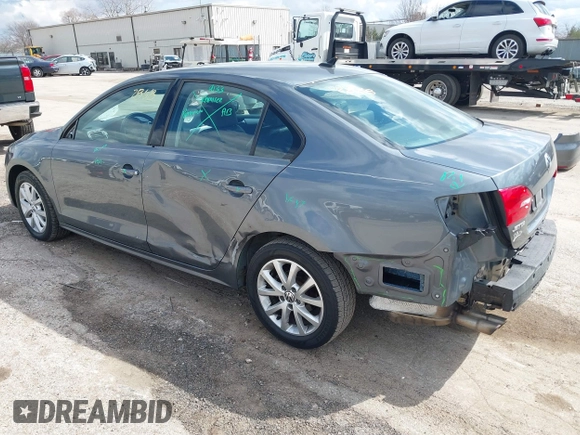 2013 Volkswagen Jetta Sedan SE with VIN 3VWDP7AJ0DM280614, listed as a IAAI auction lot 41882868 with 142,363 mi miles. Bid and sale history available at carsss.com. Image 3.