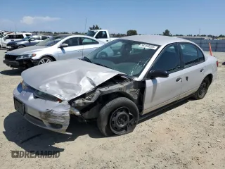2000 Saturn SL with VIN 1G8ZH5280YZ121421, listed as a Copart auction lot 58169285 with 226,014 mi miles and Salvage title. Bid and sale history available at DreamBid. Image 1.