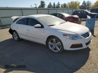 2012 Volkswagen CC Sport PZEV with VIN WVWMP7AN4CE512996, listed as a Copart auction lot 77027114 with 109,527 mi miles and Salvage Title. Bid and sale history available at carsss.com. Image 4.