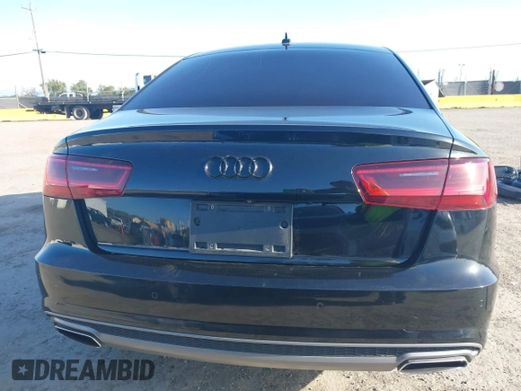 2016 Audi A6 3.0T Premium Plus with VIN WAUFGAFC2GN001285, listed as a IAAI auction lot 41938989 with 119,687 mi miles. Bid and sale history available at carsss.com. Image 17.