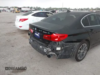 2019 BMW 5 Series 530i with VIN WBAJA5C58KWW11641, listed as a IAAI auction lot 41946359 with 48,635 mi miles and . Bid and sale history available at DreamBid. Image 6.