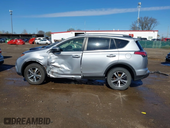 2018 Toyota RAV4 XLE with VIN JTMWFREV3JD120189, listed as a IAAI auction lot 41976999 with 62,182 mi miles and . Bid and sale history available at carsss.com. Image 15.