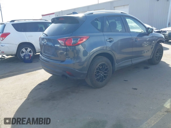 2013 Mazda CX-5 Touring with VIN JM3KE2CE6D0122405, listed as a IAAI auction lot 41743037 with 154,647 mi miles and . Bid and sale history available at carsss.com. Image 4.