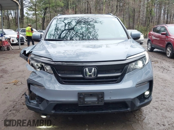 2022 Honda Pilot Special Edition with VIN 5FNYF5H20NB026028, listed as a IAAI auction lot 41801710 with 25,717 mi miles and . Bid and sale history available at carsss.com. Image 6.