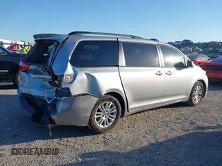 2015 Toyota Sienna XLE with VIN 5TDYK3DC9FS610925, listed as a IAAI auction lot 42022267 with 153,997 mi miles. Bid and sale history available at carsss.com. Image 4.