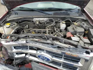 2012 Ford Escape XLS with VIN 1FMCU9C71CKB13734, listed as a Copart auction lot 55331865 with 182,323 mi miles and Salvage title. Bid and sale history available at DreamBid. Image 12.