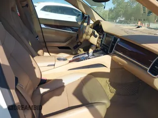 2013 Porsche Panamera with VIN WP0AA2A7XDL014047, listed as a IAAI auction lot 42010031 with 118,681 mi miles and . Bid and sale history available at DreamBid. Image 5.